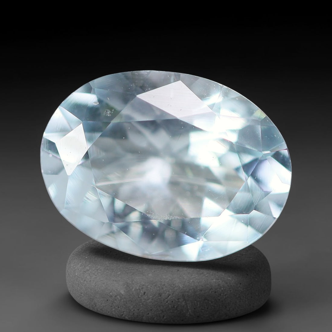 1.74ct Natural Brazilian Sky Blue Faceted Aquamarine Loose Gemstone, 9BF: This precisely faceted aquamarine boasts clear translucent pale sky blue body tone with subtle thin mineral needle and tiny scattered crystalline specks visible within its polished reflective planes i