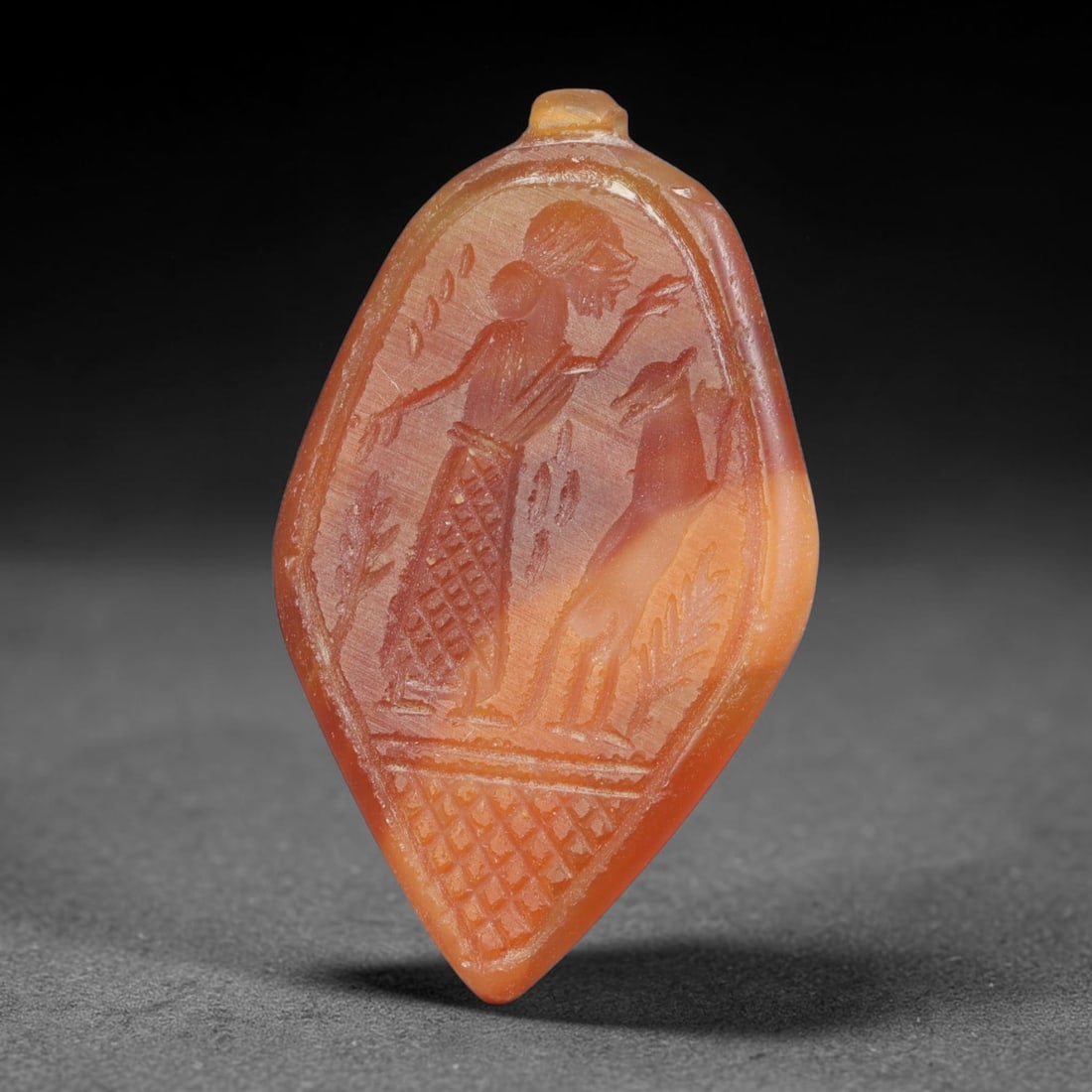 Vintage Natural Carnelian Agate Revival Indo-Persian Glyptic Figural Talisman Amulet Plaque, 78FK: This vintage talisman pendant plaque is skillfully carved from natural banded carnelian agate, crafted in a style referencing ancient Indo-Persian glyptic art traditions. The face bears detailed relie