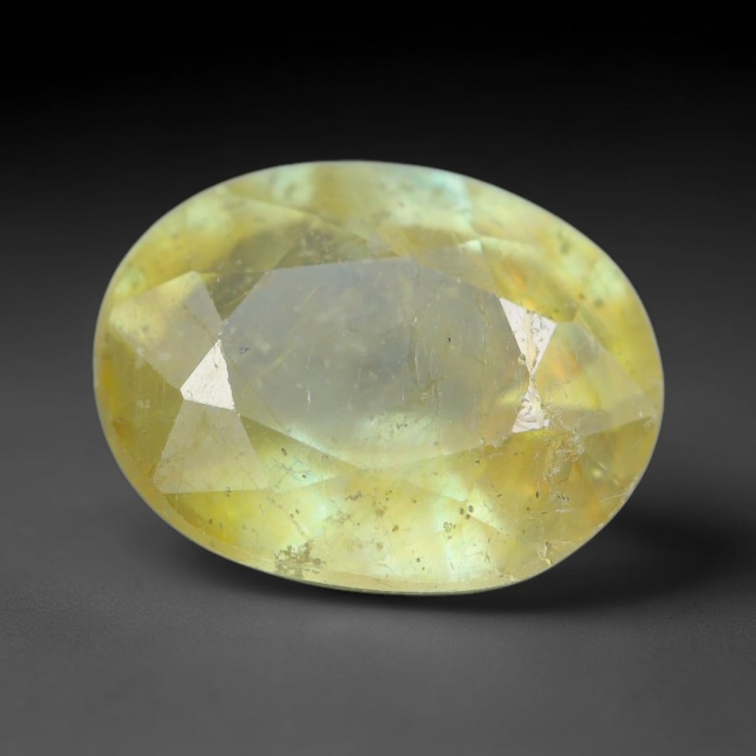 2.30 Carats Natural African Bright Lemon Yellow Sapphire Loose Gemstone, 31AG: This vivid lemon yellow sapphire radiates warm saturated golden hue with crisp faceted light dispersion, measured at 8.5x6.7x4.6mm, fine natural internal needle inclusions add authentic organic charac