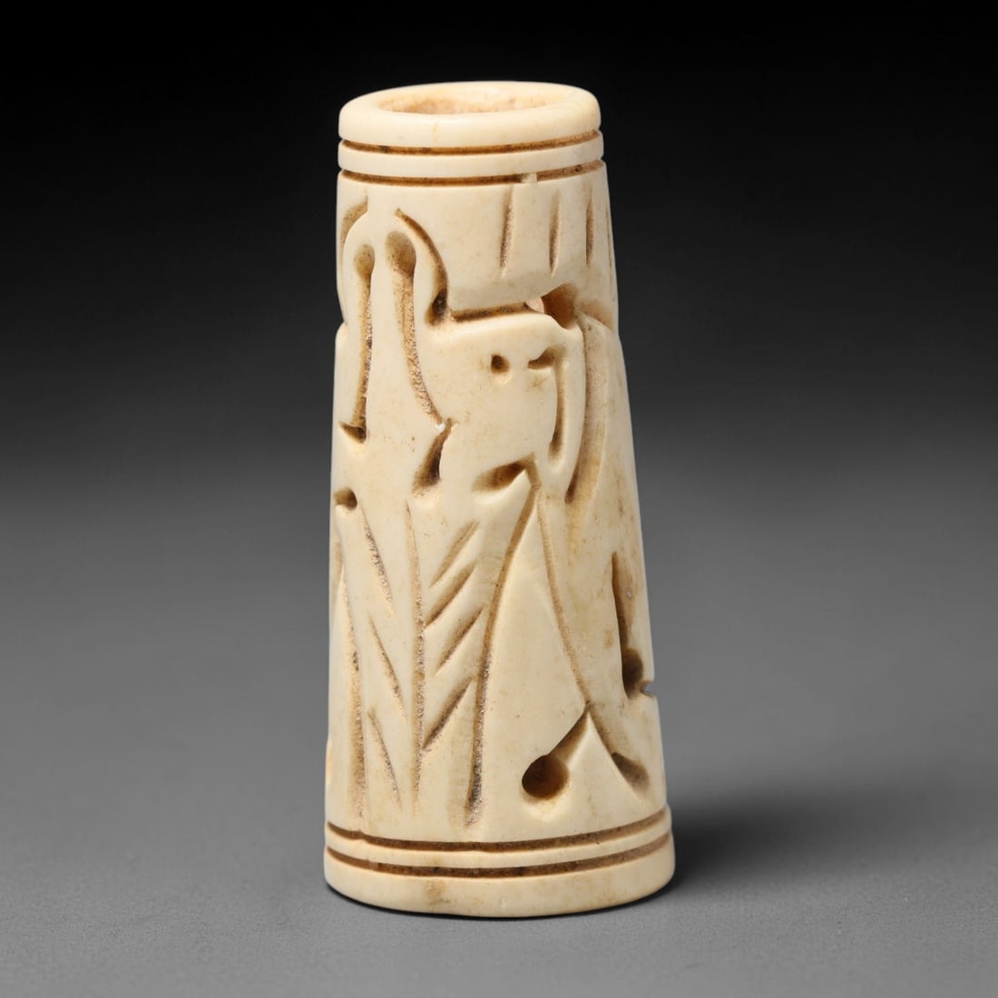 Antique Sino-Siberian Steppe Nomadic Craft Stag Antler Carved Cylinder Bead (Post 1850s), 84FV: Single bead carved from natural stag antler, originating from Sino-Siberian Steppe Nomadic craft traditions, post 1850s. Measuring 5x2cm, the piece features detailed surface carving and carries warm n