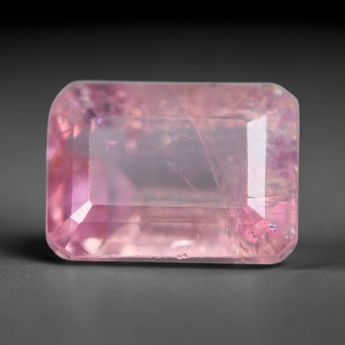 1.25 Carats Natural Mozambique Soft Pink Tourmaline Loose Gemstone, 42AK: This transparent Mozambique tourmaline carries gentle pastel pink saturation, interspersed with thin native linear mineral inclusions and faint natural internal fissures across the crystal interior, m