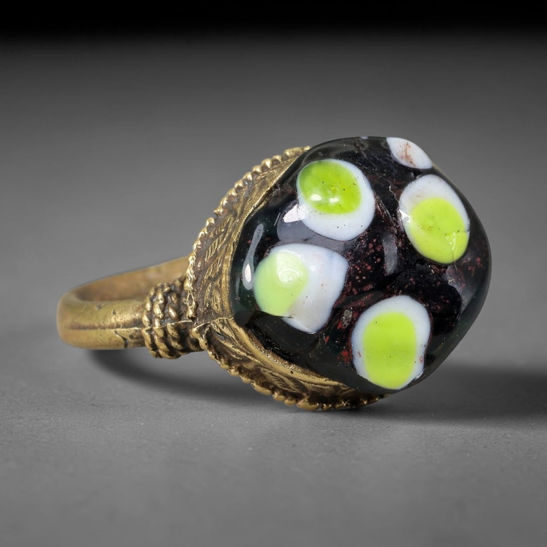 Antique Islamic Millefiori Evil Eye Glass Cabochon Set Vintage Signet Ring (1700-1900 CE), 60AN: The primary collectible value resides within the inset antique millefiori evil-eye glass cabochon, authentic genuine antique glass (distinguished from earlier ancient glass and modern vintage glass) c