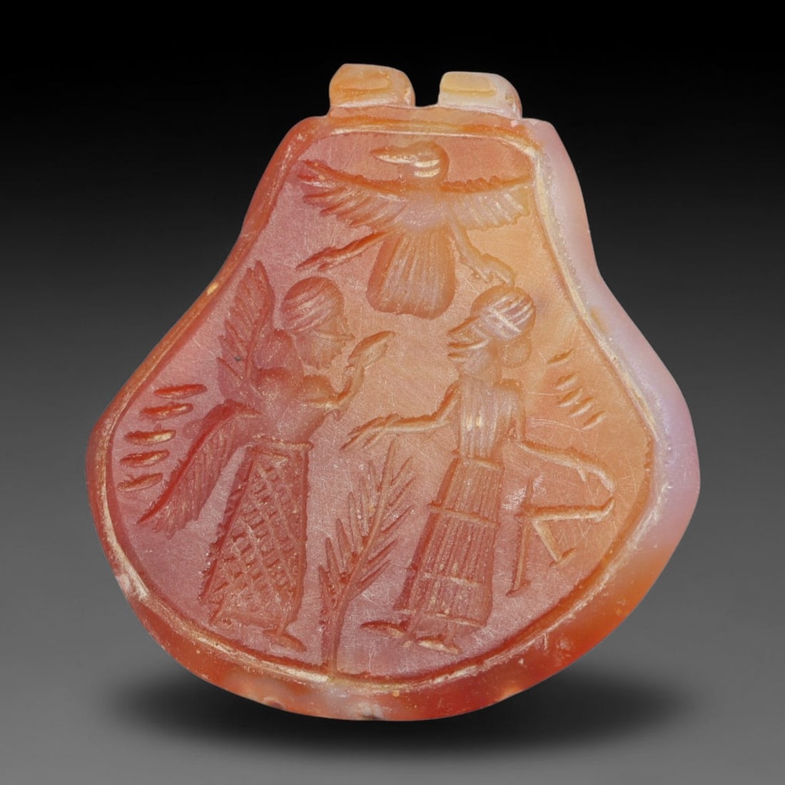 Vintage Natural Carnelian Agate Revival Indo-Persian Glyptic Figural Talisman Amulet Plaque, 68FK: This vintage talisman pendant plaque is skillfully carved from natural banded carnelian agate, crafted in a style referencing ancient Indo-Persian glyptic art traditions. The face bears detailed relie