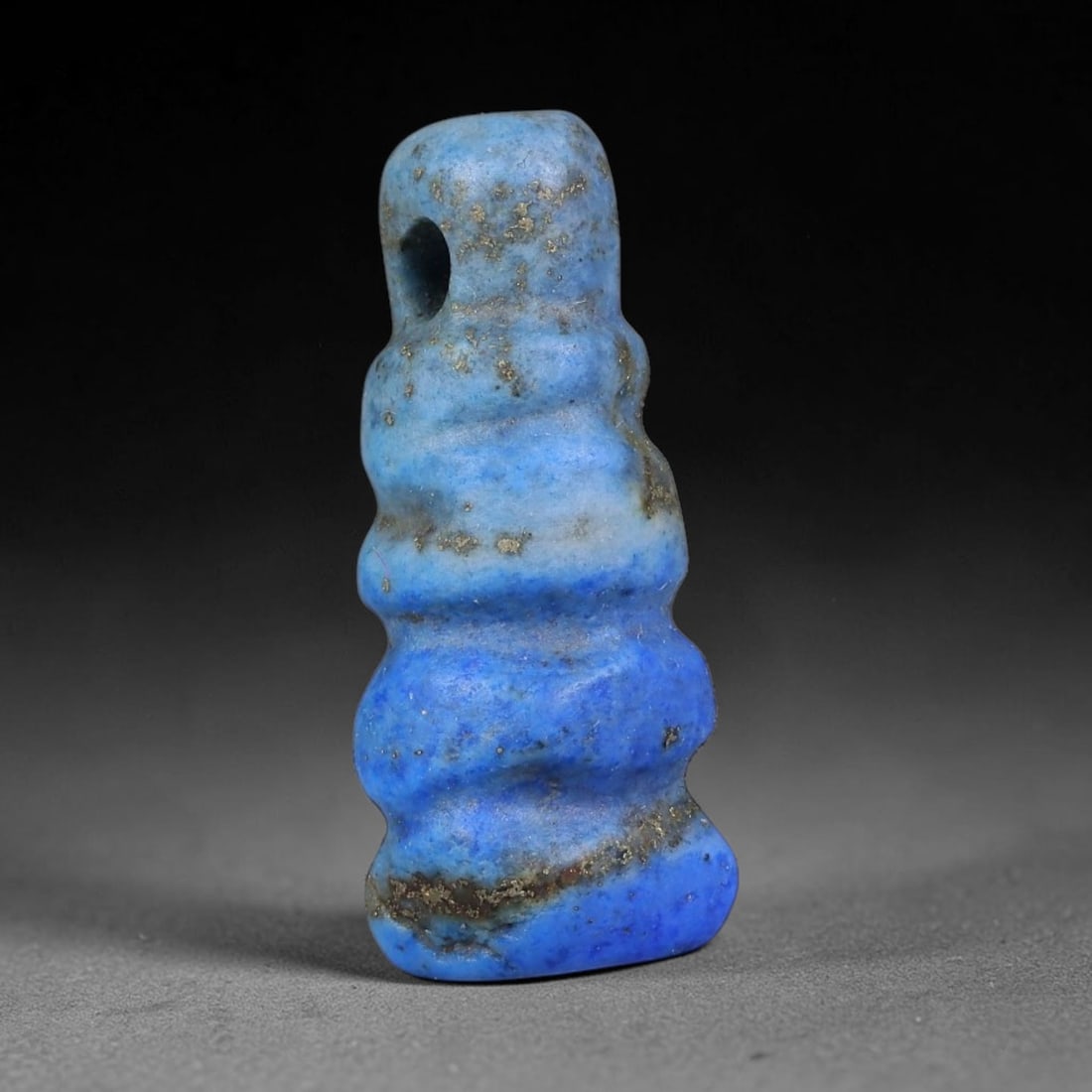 Ancient Medieval Coptic Egyptian Lapis Lazuli Amulet (400-800 CE), 68EG: This antique lapis lazuli amulet originates from Ancient Medieval Coptic Egyptian cultural tradition, created to function as a wearable protective talisman for personal spiritual safeguard. The deepbl