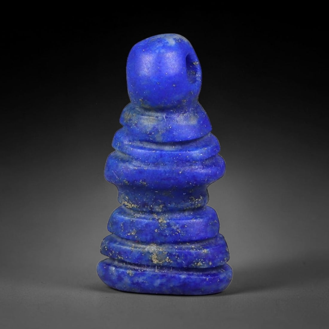 Ancient Medieval Coptic Egyptian Lapis Lazuli Amulet (400-800 CE), 61EG: This antique lapis lazuli amulet originates from Ancient Medieval Coptic Egyptian cultural tradition, created to function as a wearable protective talisman for personal spiritual safeguard. The deepbl