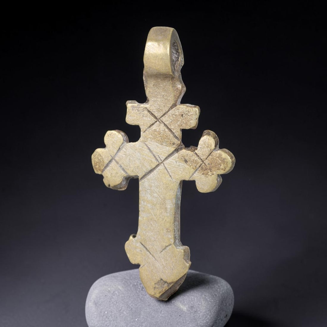 Vintage Ethiopian Copper Alloy Cross Pendant, 29EJ: Crafted from copper alloy, this traditional Ethiopian cross pendant features integrated suspension loop for wear. Shows authentic surface patina consistent with vintage origin. Dimensions: 4.5x2.3cm. 