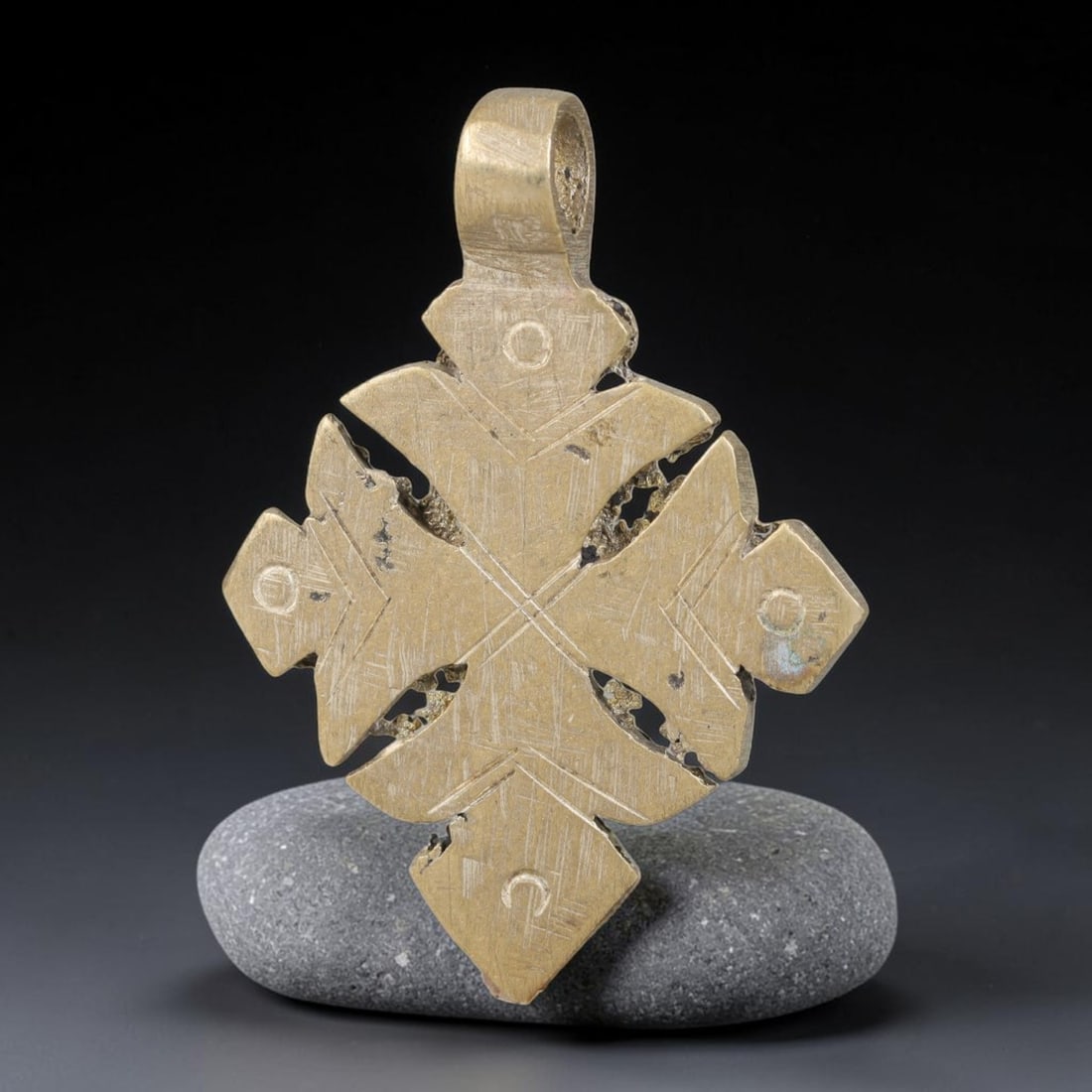 Vintage Ethiopian Copper Alloy Cross Pendant, 22EJ: Crafted from copper alloy, this traditional Ethiopian cross pendant features integrated suspension loop for wear. Shows authentic surface patina consistent with vintage origin. Dimensions: 4.5x3cm. So