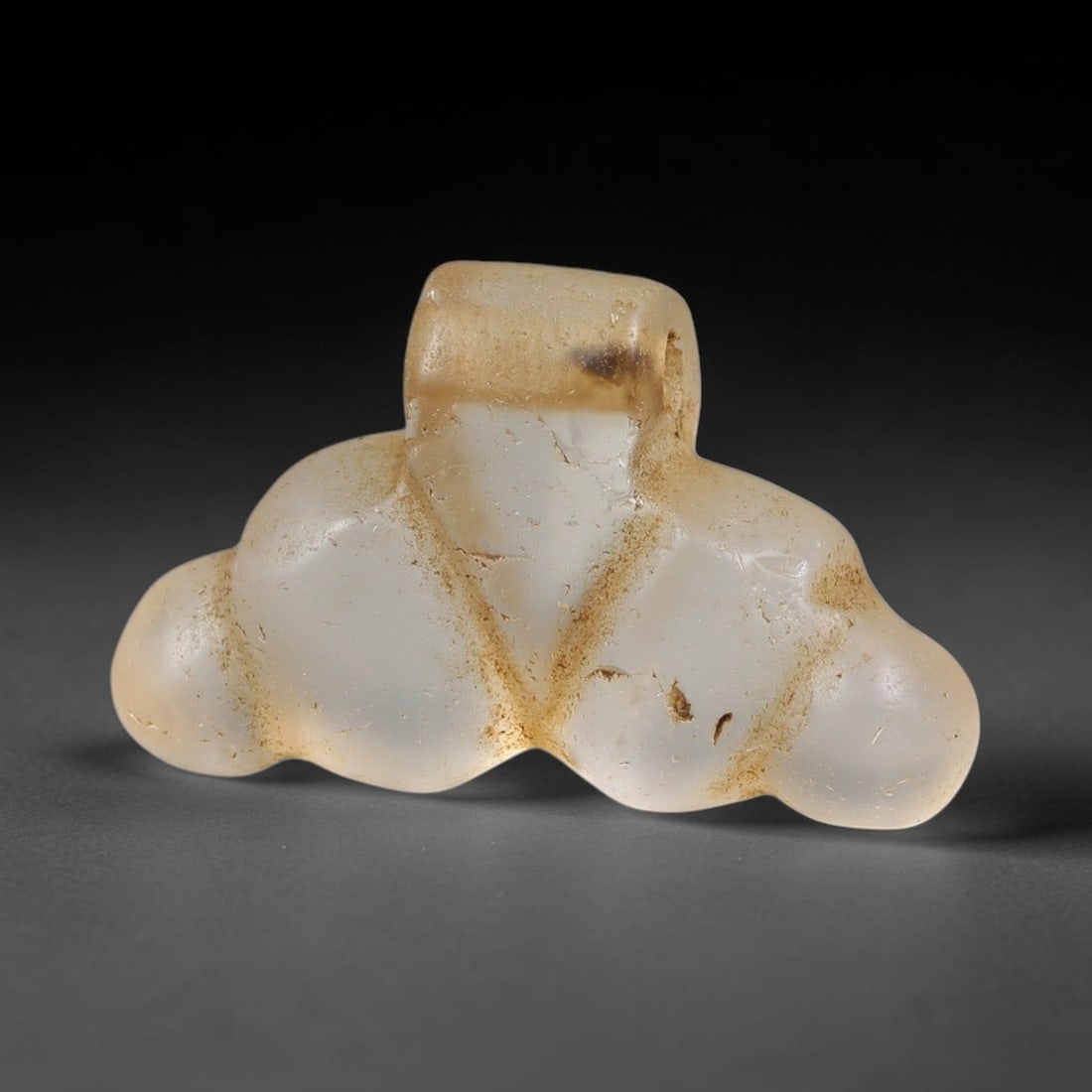 Ancient Medieval Coptic Christian Egyptian Culture Rock Crystal Amulet (300-1000 CE), 46EG: This antique rock crystal amulet originates from Coptic Christian Egyptian Culture, a region with a long-standing tradition of crafting translucent hardstone talismans for devotional and funerary use.
