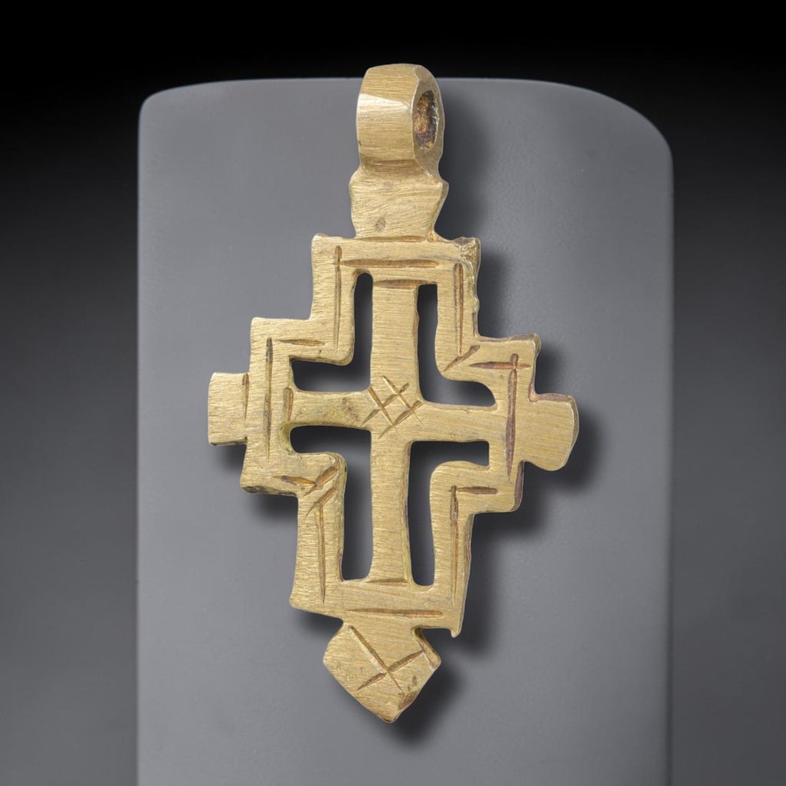 Vintage Ethiopian Copper Alloy Cross Pendant, 19EJ: Crafted from copper alloy, this traditional Ethiopian cross pendant features integrated suspension loop for wear. Shows authentic surface patina consistent with vintage origin. Dimensions: 4.5x2.6cm. 