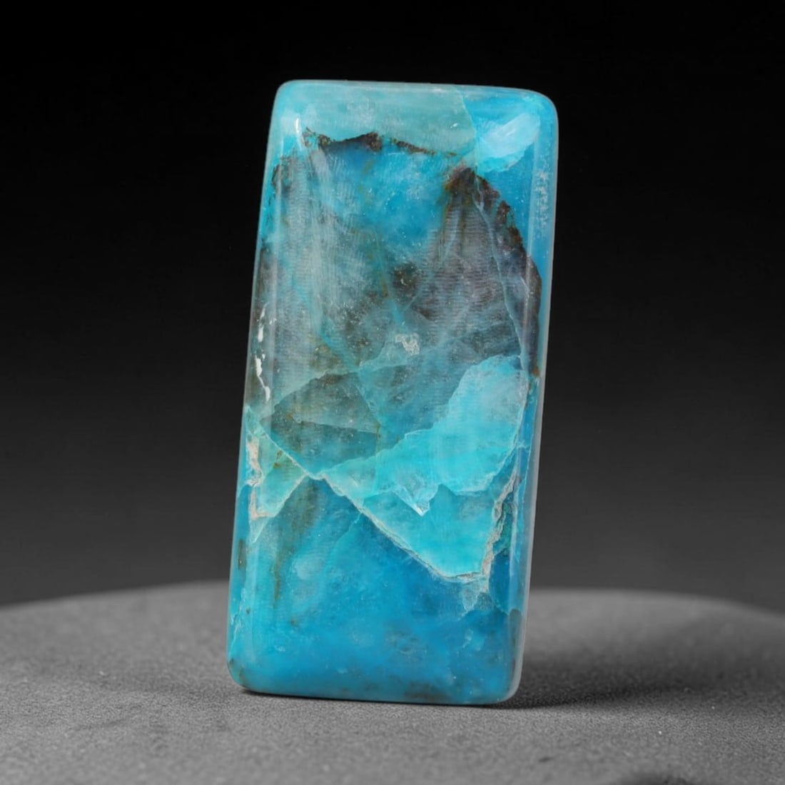 8ct Natural Peruvian Chrysocolla Cabochon Loose Gemstone, 85EH: This natural chrysocolla cabochon from Peru displays beautiful blended mineral patterns across its smoothly polished surface. Dimensions measure 19x9x4mm, this wellfinished cabochon works wonderfully 