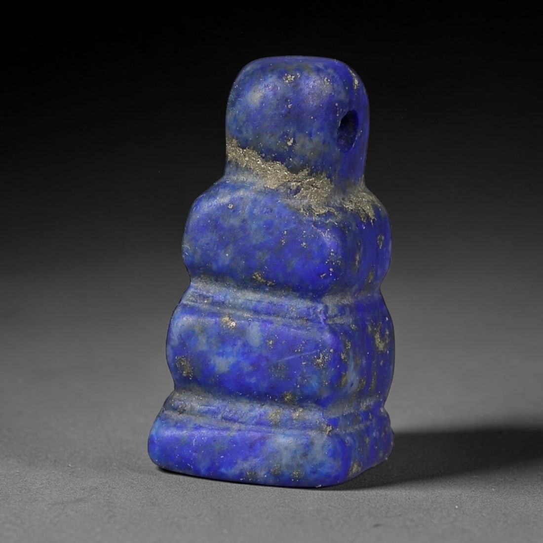 Ancient Medieval Coptic Egyptian Lapis Lazuli Amulet (400-800 CE), 21EG: This antique lapis lazuli amulet originates from Ancient Medieval Coptic Egyptian cultural tradition, created to function as a wearable protective talisman for personal spiritual safeguard. The deepbl