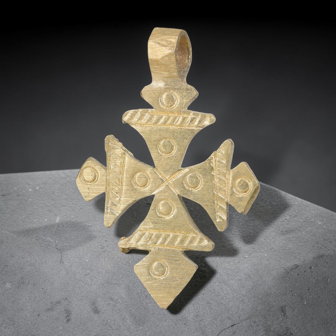 Vintage Ethiopian Copper Alloy Cross Pendant, 26EJ: Crafted from copper alloy, this traditional Ethiopian cross pendant features integrated suspension loop for wear. Shows authentic surface patina consistent with vintage origin. Dimensions: 4.3x3cm. So
