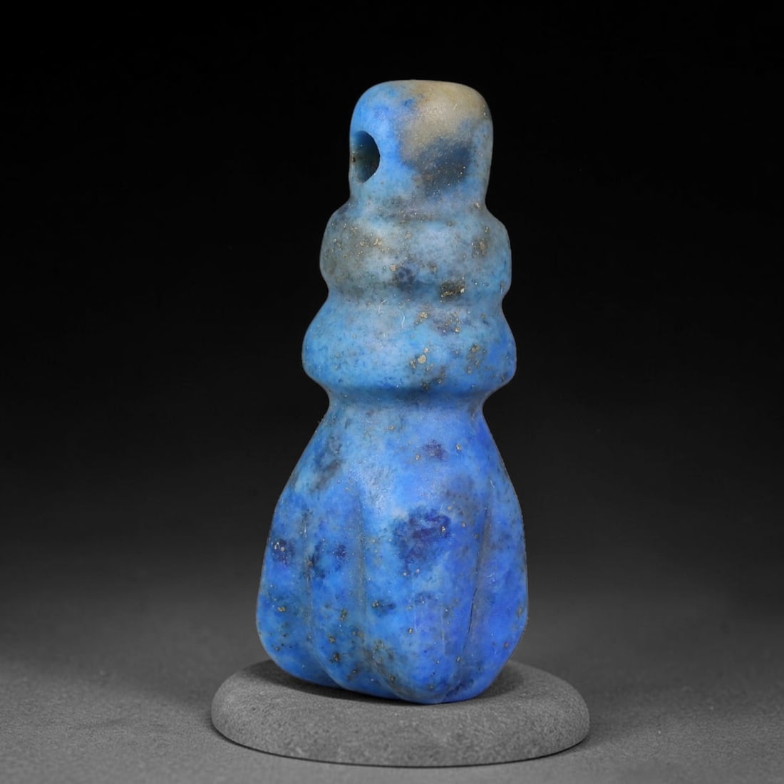 Ancient Medieval Coptic Egyptian Lapis Lazuli Amulet (400-800 CE), 67EG: This antique lapis lazuli amulet originates from Ancient Medieval Coptic Egyptian cultural tradition, created to function as a wearable protective talisman for personal spiritual safeguard. The deepbl