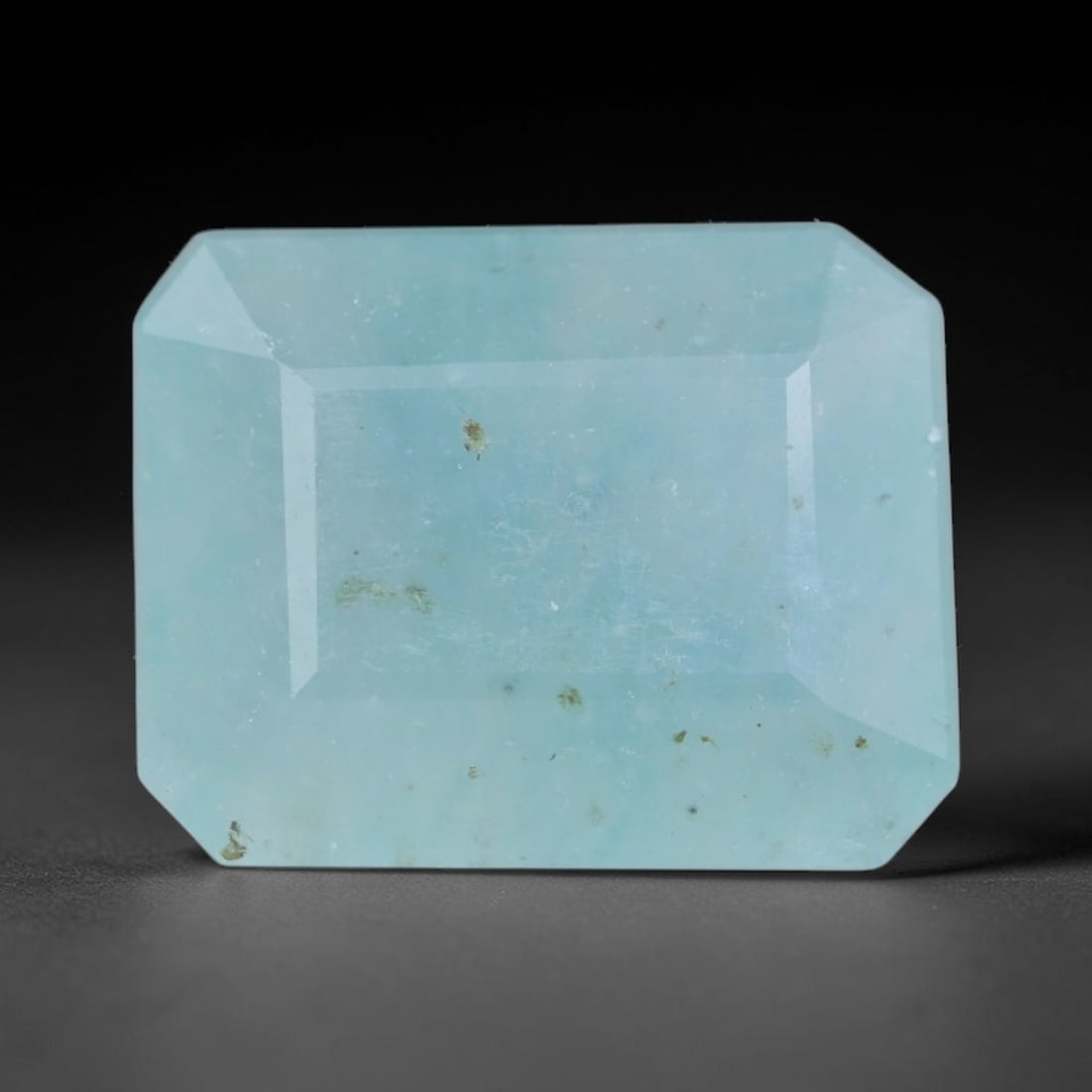 4.35ct Natural Madagascan Faceted Grandidierite Rare Loose Gemstone, 59BD: This expertly faceted finished grandidierite holds soft translucent body tone with fine faint natural internal veining visible beneath precisely cut reflective facets within its 11.4x9x5.3mm calibrate