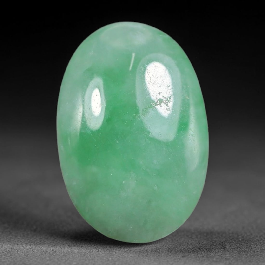 5.15ct Natural Burmese Type A Apple Green Jadeite Jade Cabochon, 85FA: This single loose natural Burmese Type A apple green jadeite jade cabochon, completely untreated, free of artificial dye, bleaching, or resin filling, preserving the original natural mineral crystal s