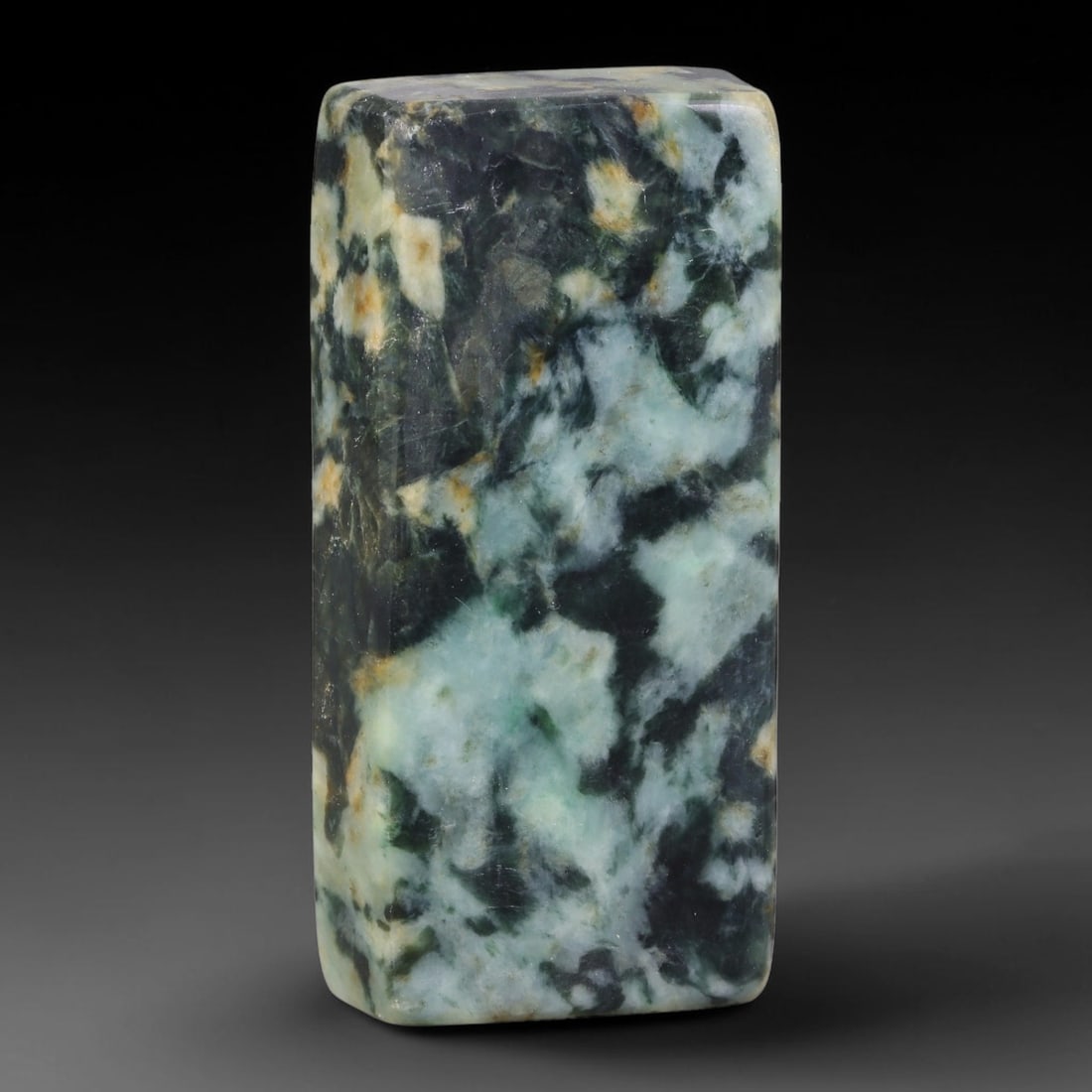 310ct Natural Type A Burmese Jadeite Jade Sliced Rough, 2FB: This specimen is a sliced rough block of natural Type A Burmese jadeite jade. The interior displays natural colour zoning with visible mineral veining and crystalline patterns typical of unprocessed j