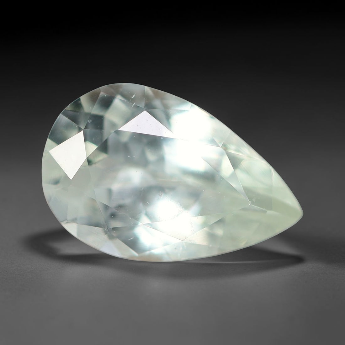 1.67ct Natural Brazilian Sky Blue Faceted Aquamarine Loose Gemstone, 4BF: This precisely faceted aquamarine boasts clear translucent pale sky blue body tone with subtle thin mineral needle and tiny scattered crystalline specks visible within its polished reflective planes i