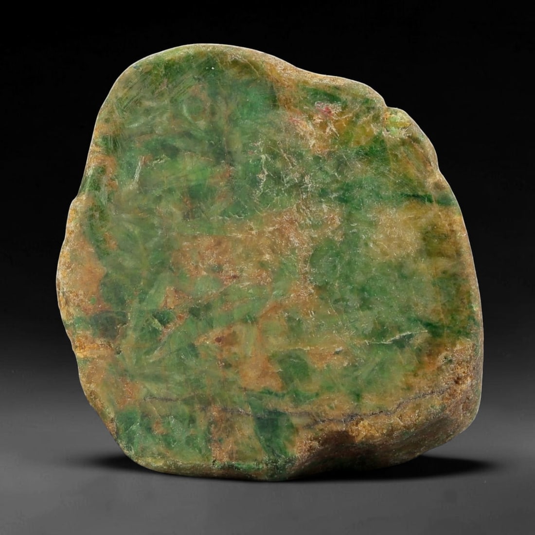 180Ct Natural Type A Burmese Jadeite Jade Rough Stone - Multi-Color Raw Material, 37EA: This is a natural, unpolished rough stone of Type A Burmese jadeite jade, weighing 180 carats and measuring 4x3.5cm. The stone features a striking combination of rich green and warm earthy tones, with