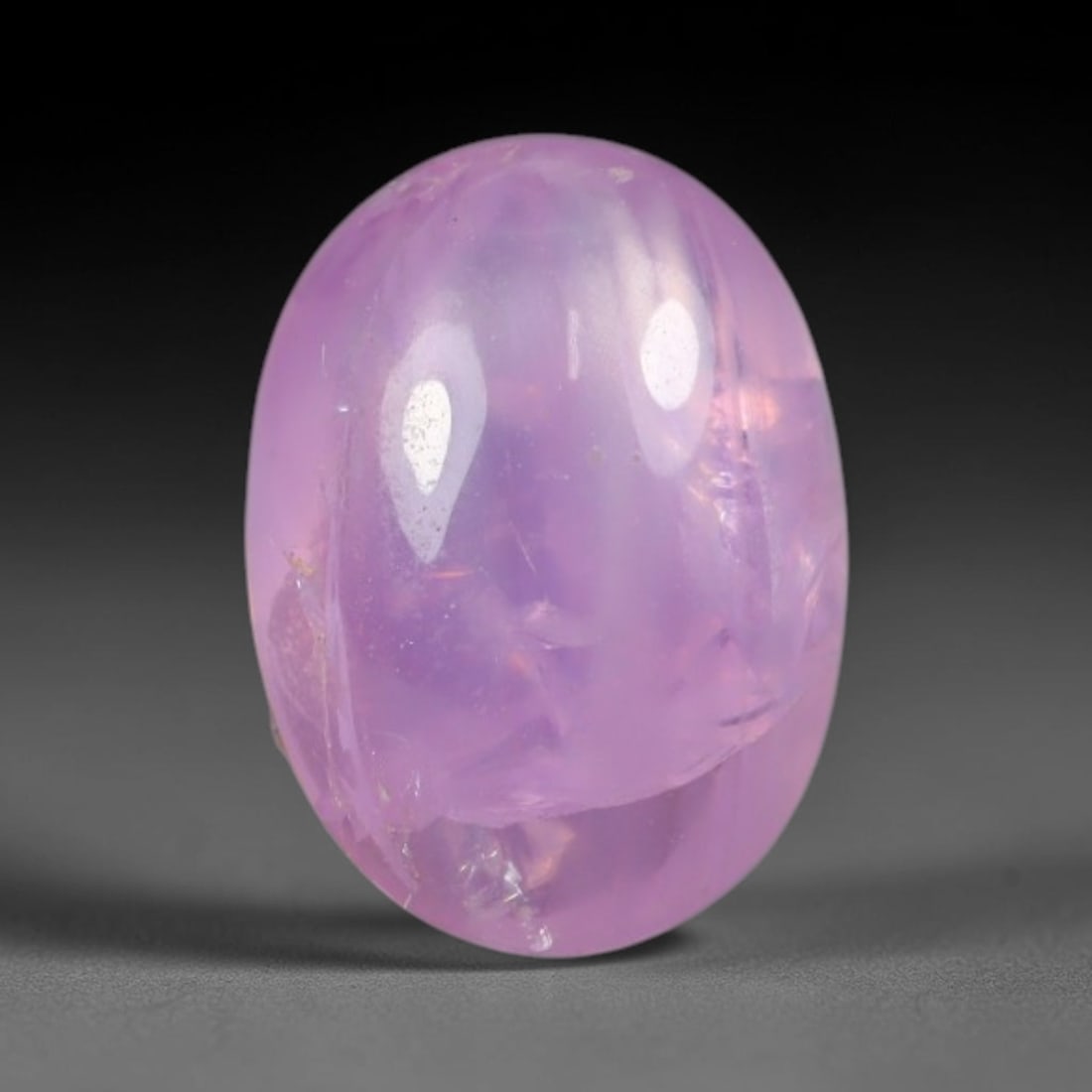 2.92ct Natural Mozambican Soft Blush Pink Ruby Cabochon Loose Gemstone, 14AS: This smoothly domed polished cabochon ruby carries a delicate soft blush pink body tone, featuring faint natural internal mineral veining and minor subtle fracture planes visible beneath its glossy un