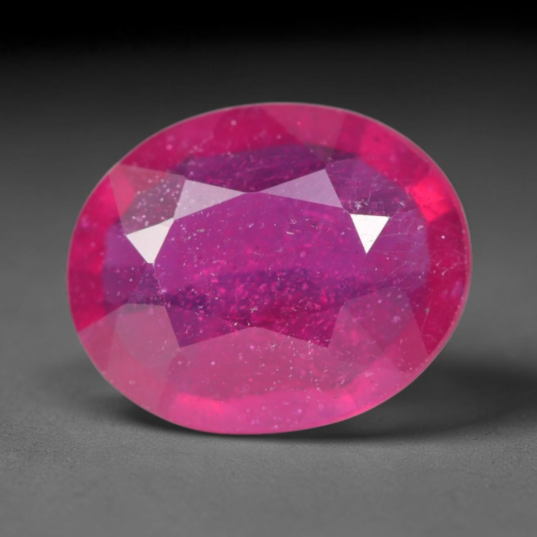 3.43ct Natural Madagascar Vivid Magenta Red Ruby Loose Gemstone, 39BA: This vivid magenta-hued Madagascar ruby boasts rich saturated red-pink saturation scattered with tiny fine mineral specks and distinct two-phase fluid bubble inclusions throughout its translucent crys