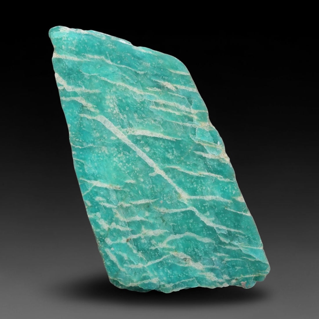 115ct Natural Russian Ural Amazonite Slab Rough, 90EB: This intact amazonite slab features distinct parallel mineral banding running uniformly across its naturally split flat surface within 54x30x7mm slab dimensions, retaining unmodified natural geologica