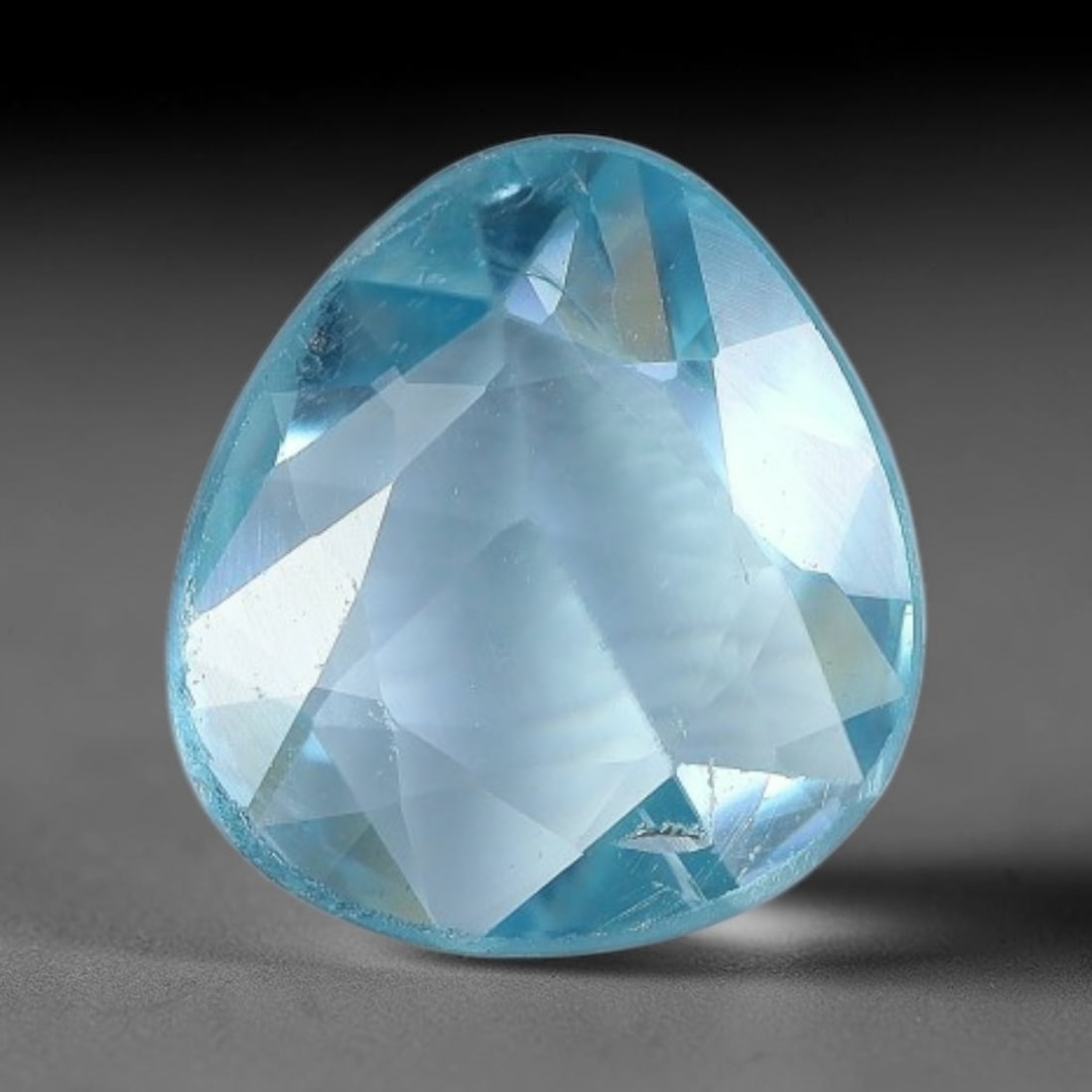 1.85ct Natural Cambodian Blue Zircon Rose Cut Loose Gemstone, 76BV: This fascinating rose cut gemstone is natural blue zircon sourced from Cambodia. The vintage-inspired rose cut facets create soft, diffused light return that beautifully showcases its vivid saturated 