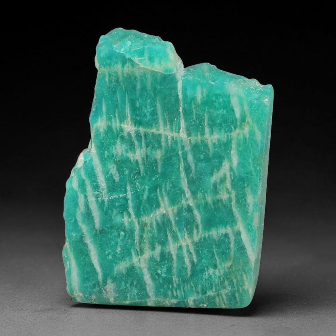 65ct Natural Russian Ural Amazonite Slab Rough, 78EB: This intact amazonite slab features distinct parallel mineral banding running uniformly across its naturally split flat surface within 35x25x7mm slab dimensions, retaining unmodified natural geologica
