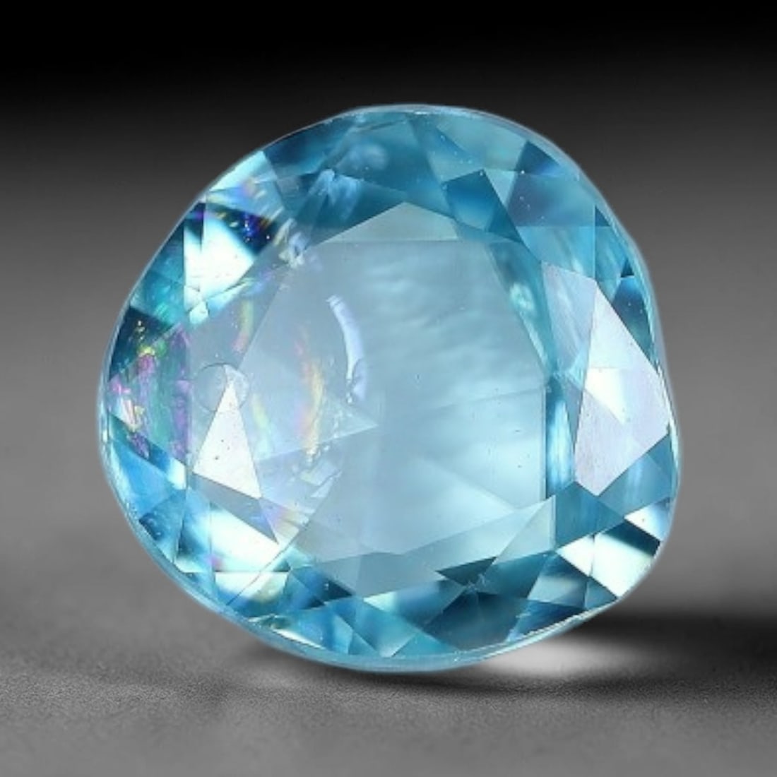 1.66ct Natural Cambodian Blue Zircon Rose Cut Loose Gemstone, 69BV: This fascinating rose cut gemstone is natural blue zircon sourced from Cambodia. The vintage-inspired rose cut facets create soft, diffused light return that beautifully showcases its vivid saturated 