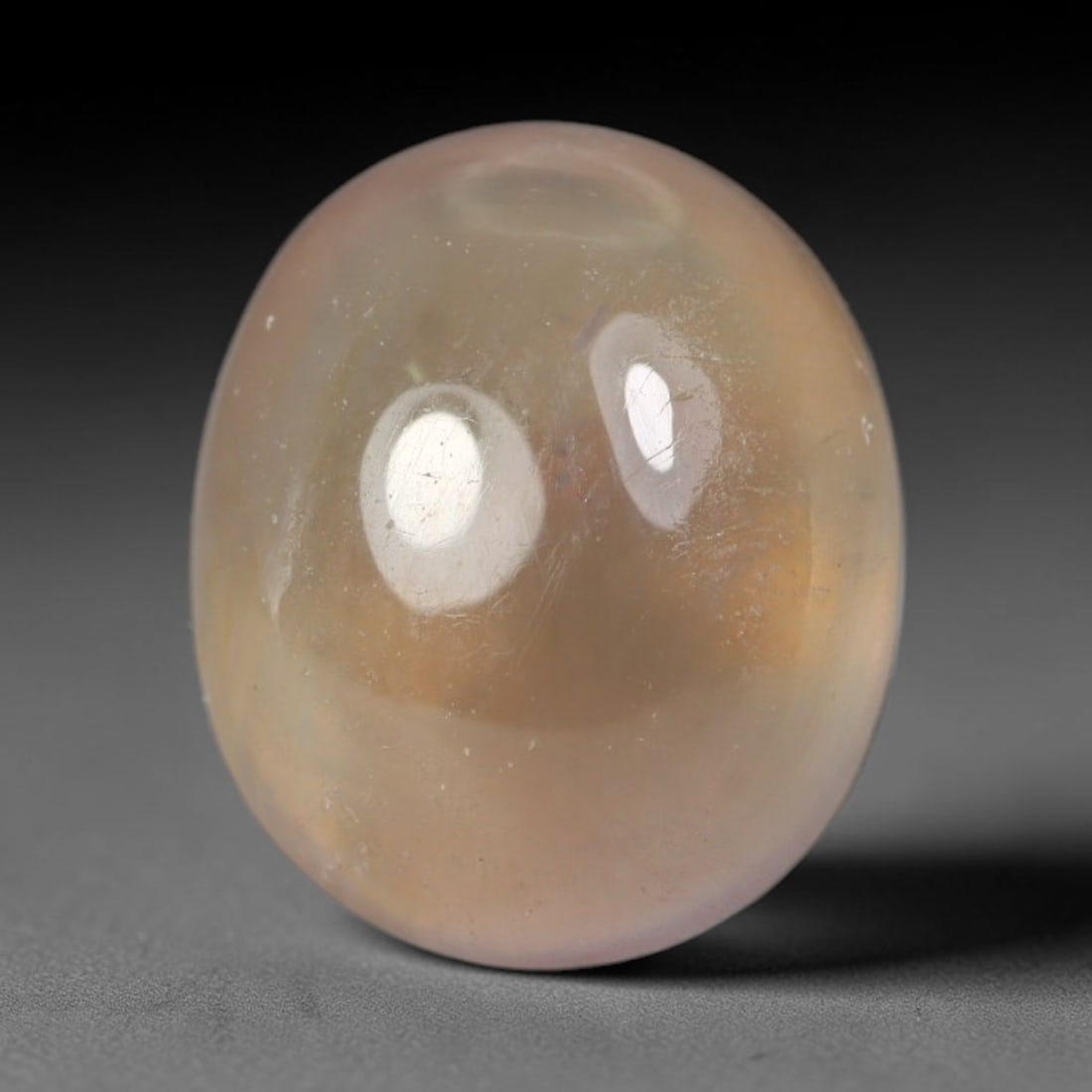 3.60ct Natural Sri Lankan Padparadscha Sapphire Loose Gemstone, 48BA: This fully polished Padparadscha sapphire features soft warm peach-orange blended body tone, with faint natural mineral traces scattered throughout its crystalline interior, measured at calibrated dim