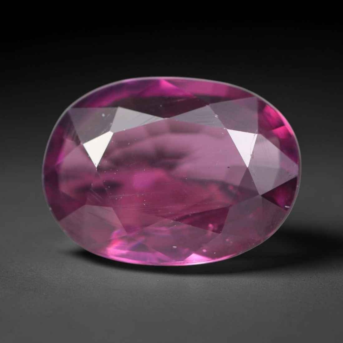 1.93ct Natural Tanzanian Rhodolite Grape Garnet Faceted Loose Gemstone, 75BA: This expertly faceted grape garnet, a scarce saturated purple-magenta rhodolite variant, features transparent crystal structure dotted with faint microscopic mineral specks within its precisely cut re