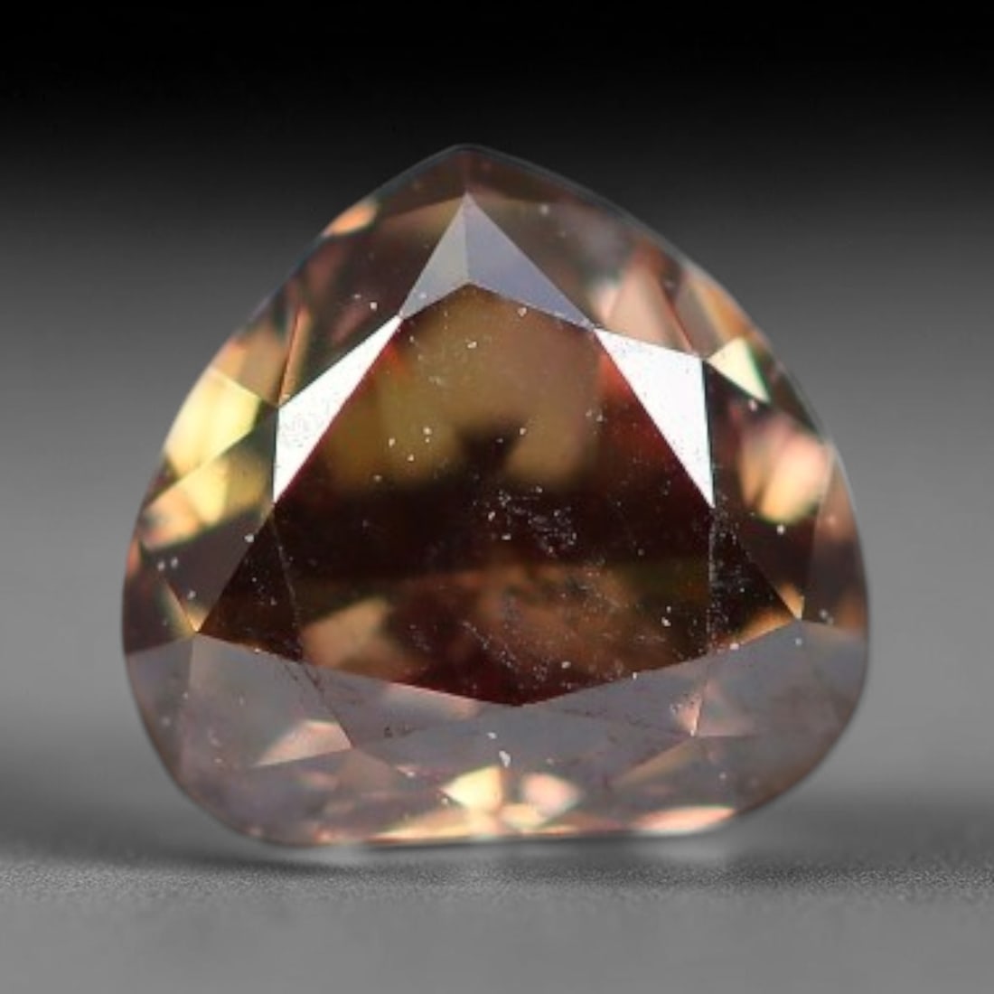 0.19ct Natural Untreated Fancy Brownish Pink Diamond Loose Gemstone, 29BG: This polished natural diamond displays attractive brownish-pink blended body saturation, dotted with fine microscopic mineral specks within its crystalline interior, measured at calibrated dimensions 