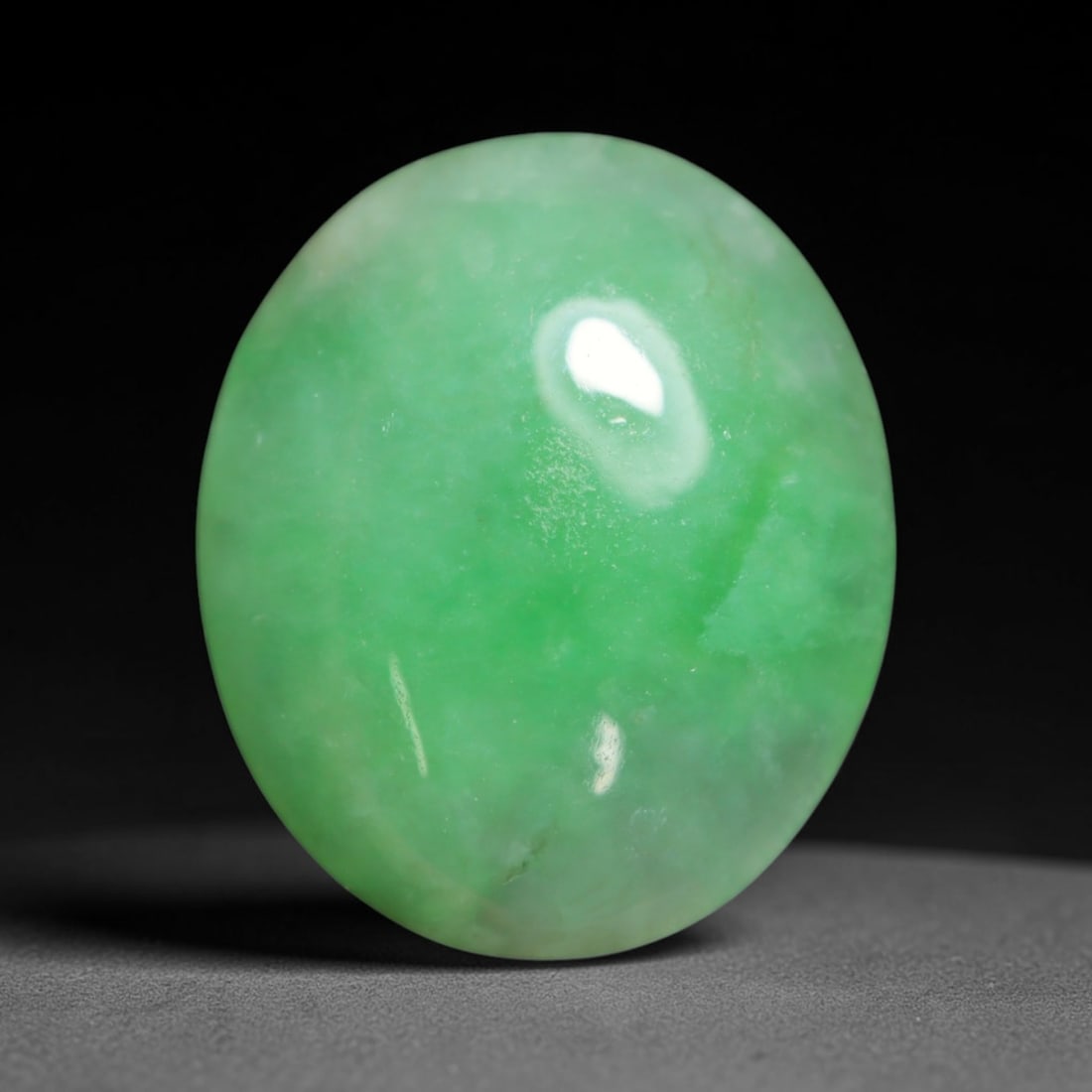 3.68ct Natural Burmese Type A Jadeite Jade Cabochon Loose Gemstone, 43BT: This smoothly polished cabochon is genuine Type A Burmese jadeite jade. It displays soft, even green saturation with gentle natural tonal variation across the polished surface, featuring a fine compac