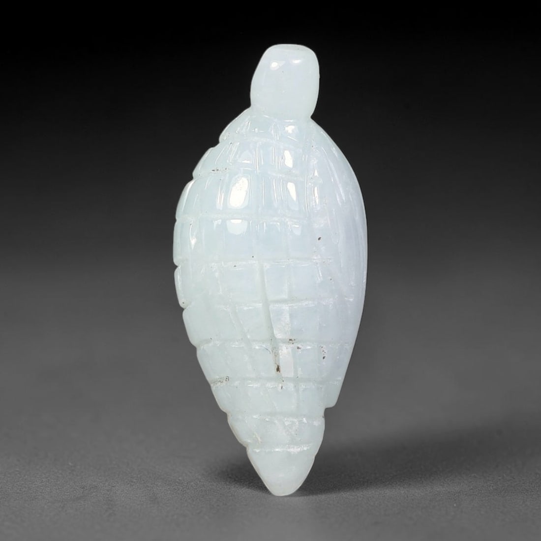 Natural Burmese Type A Jadeite Jade Hand Carved Pendant, 8BS: Artisan hand-carved untreated Burmese Type A jadeite jade pendant measuring 30x13 mm. Carefully sculpted with detailed relief craftsmanship and finished with a smooth glossy polish. Authentic Type A j