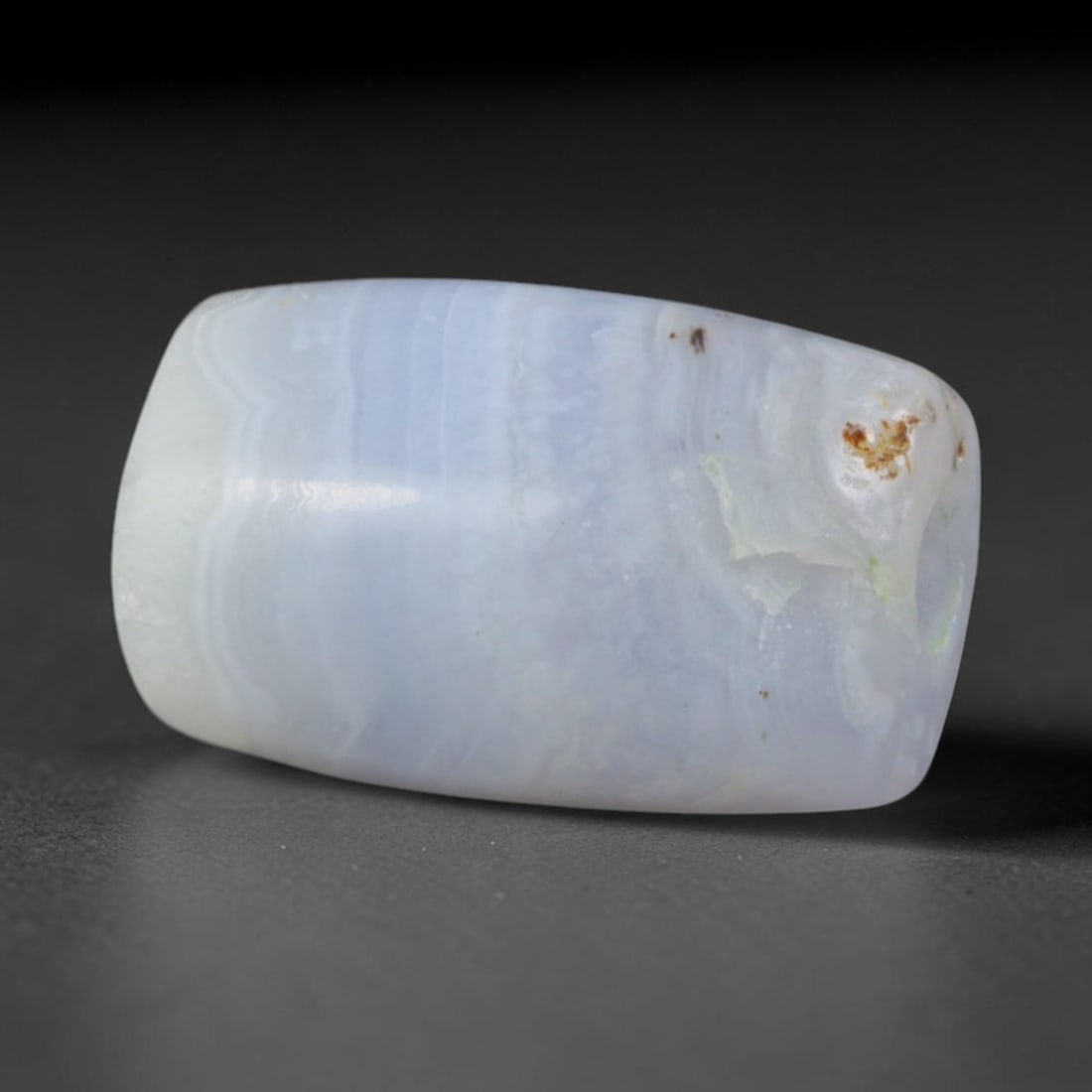 Ancient Indus Valley / Harappan Civilization Banded Agate Barrel Bead (2600-1900 BCE), 14AD: This antique banded agate barrel bead originates from the Indus Valley / Harappan Civilization, the ancient South Asian hub that pioneered standardized agate drilling and chemical banded chalcedony be