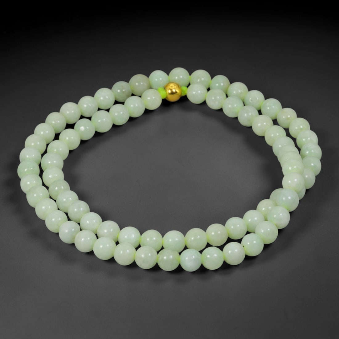 Natural Burmese Type A Jadeite Jade Round Bead Necklace with Gold Gilt Accent Bead, 12BL: Elegant hand-strung necklace made from polished natural untreated Burmese Type A jadeite jade spherical beads, each bead measuring 8 mm in diameter. The jadeite features a soft pale milky celadon hue 