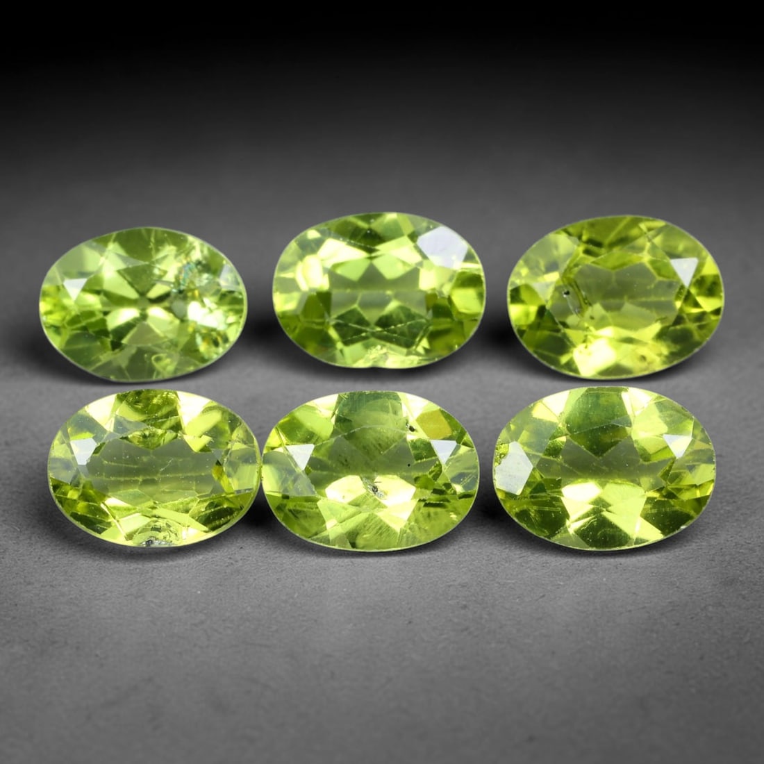 7.61ct Natural Pakistani Himalayan Peridot Parcel Loose Gemstones, 37BE: This matched parcel of polished Himalayan peridot originates from Pakistan's renowned mountain mining regions, showcasing vibrant lime-green body saturation, with fine native mineral inclusions natura