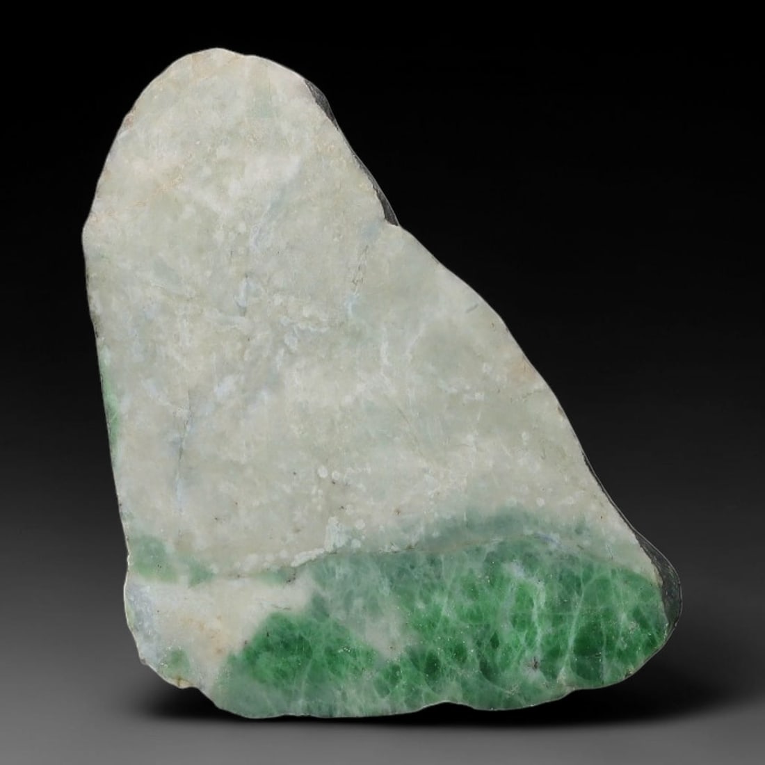 110ct Natural Type A Burmese Jadeite Jade Sliced Rough, 23AZ: This specimen is a sliced rough block of natural Type A Burmese jadeite jade. The interior displays natural colour zoning with visible mineral veining and crystalline patterns typical of unprocessed j