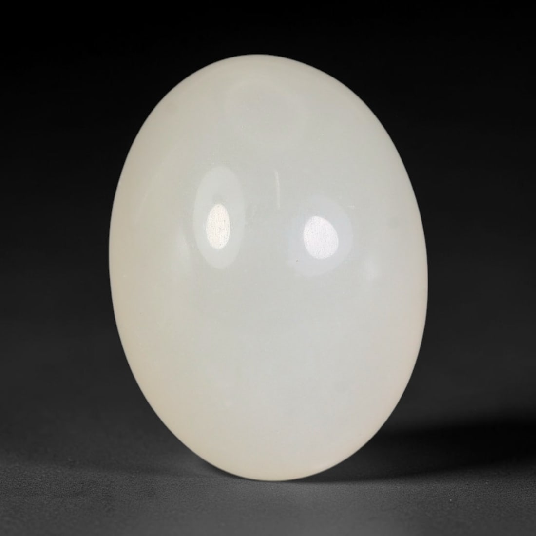 17.16 Carats Natural Ceylon Soft Milky White Moonstone Loose Gemstone, 75FE: This natural Ceylon moonstone carries a smooth milky white base with subtle gentle adularescent glow across its polished surface, measured at 18.3x13.6x9.7mm, showcasing clean even transparency with m