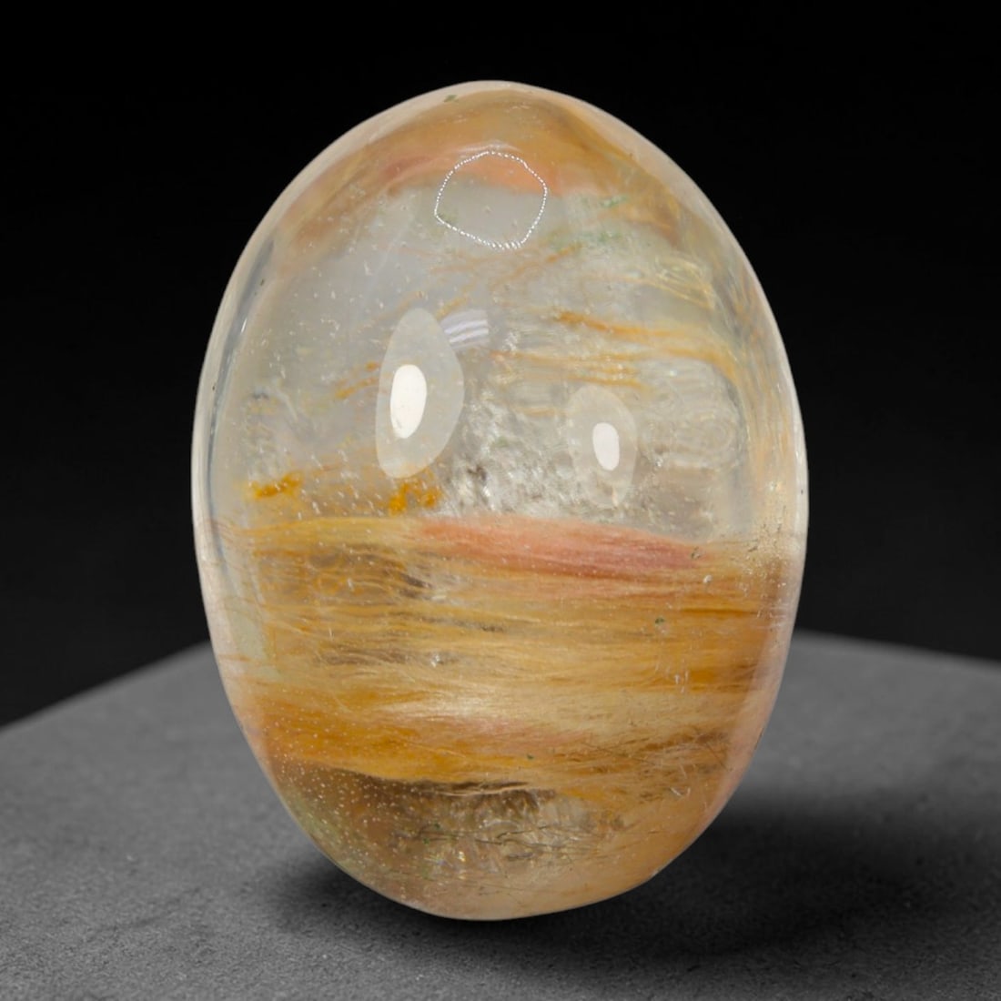 21ct Natural Brazilian Phantom Quartz Oval Cabochon Loose Gemstone, 98BM: This smoothly polished cabochon of natural phantom quartz preserves delicate layered phantom crystal formations enclosed inside transparent quartz host. The domed polished surface offers unobstructed 
