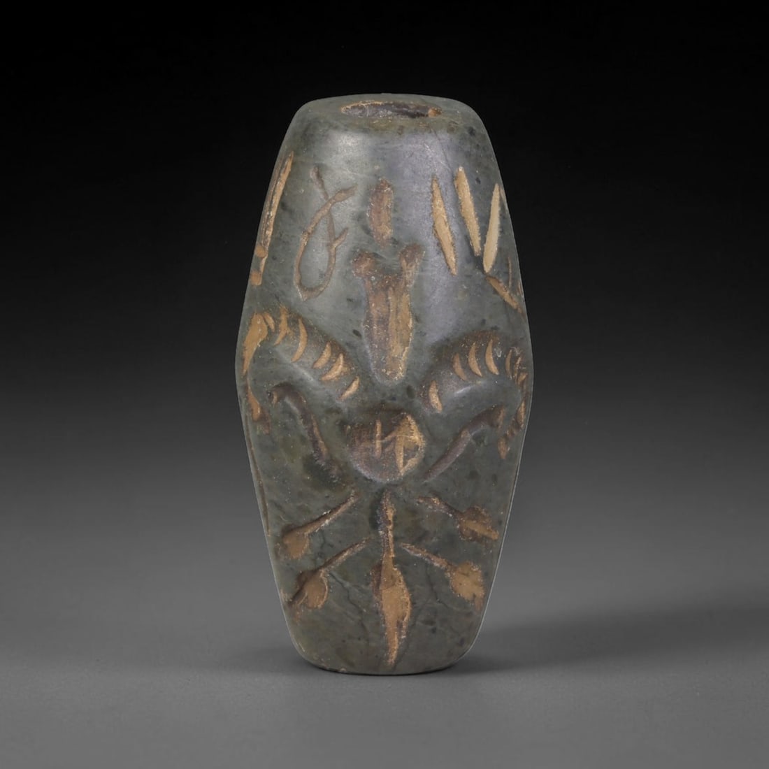 Ancient Sasanian Persian Carved Stone Cylinder Amulet (224-651 CE), 48EF: This antique carved stone cylinder amulet originates from the Sasanian Persian Empire, famed for zoomorphic talismanic carvings crafted for personal protection across late antique Western Asia. The da