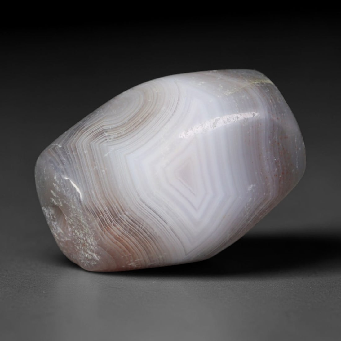 Ancient Bactrian Bronze Age Faceted Geometric Banded Eye Agate Barrel Bead (2200-1500 BCE), 95AD,,: This antique faceted banded agate barrel bead originates from the ancient Bactrian Bronze Age Culture of Central Asia, a major early lapidary center renowned for producing precision-cut talismanic aga