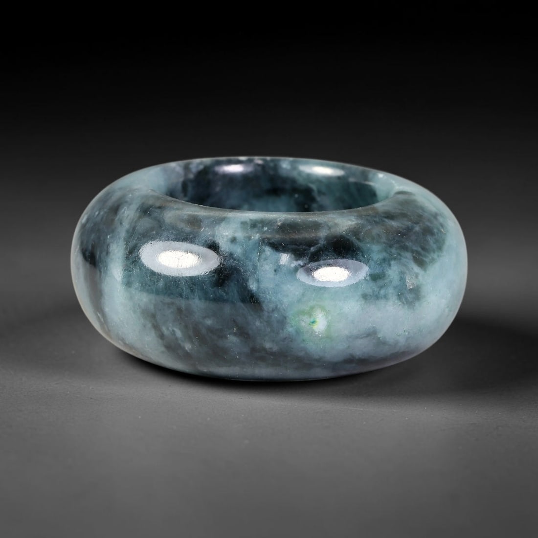 Natural Burmese Type A Jadeite Jade Wide Band Ring, 11BK: Polished untreated Burmese Type A jadeite jade wide band ring, US ring size 13 with a substantial band width of 15 mm. The jadeite features a soft pale mint green base naturally streaked with flowing 