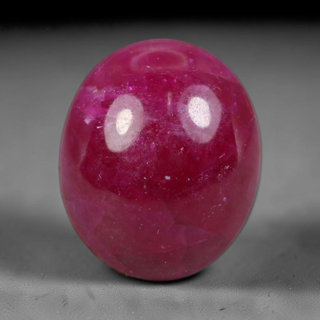 4.14ct Natural Mozambican Deep Crimson Red Ruby Cabochon Loose Gemstone, 20AS: This smoothly polished cabochon ruby holds a rich deep crimson red body hue, covered with fine natural surface fracturing and tiny scattered mineral specks across its domed polished surface within its