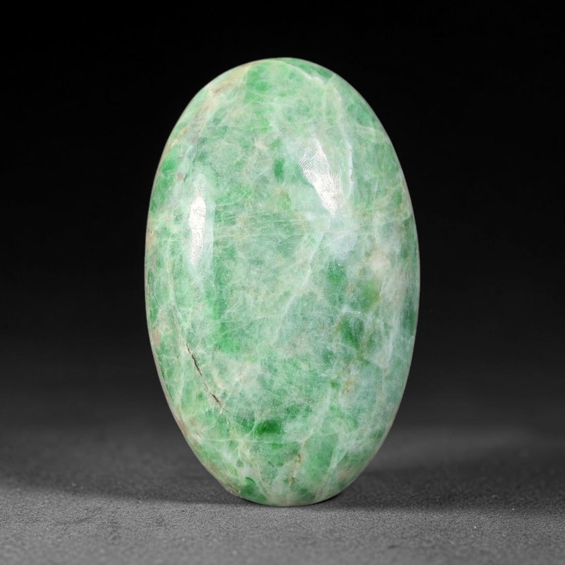 20.44ct Natural Burmese Type A Jadeite Jade Cabochon, 63FP: This single loose natural Burmese Type A jadeite jade cabochon, fully untreated with no dyeing, bleaching or resin impregnation, this genuine Type A jade retains its all-natural crystalline structure 