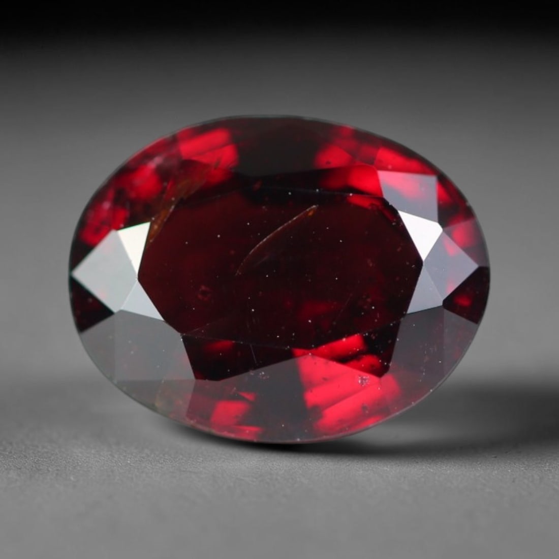 3.44ct Natural Mozambican Deep Crimson Red Faceted Almandine Garnet Loose Gemstone, 25BE: This meticulously faceted garnet features a dense, rich red crystalline body dotted with subtle micro mineral inclusions scattered evenly throughout its transparent interior, precision-cut reflective 