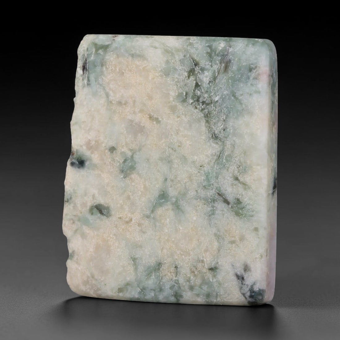 221ct Natural Type A Burmese Jadeite Jade Sliced Rough, 56FD: This specimen is a sliced rough block of natural Type A Burmese jadeite jade. The interior displays natural colour zoning with visible mineral veining and crystalline patterns typical of unprocessed j