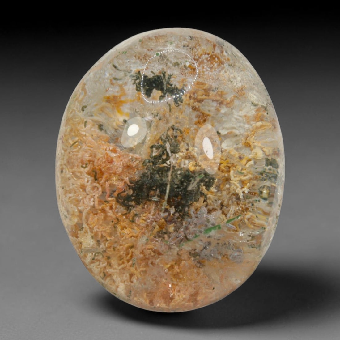 29ct Natural Brazilian Phantom Quartz Oval Cabochon Loose Gemstone, 68BM: This smoothly polished cabochon of natural phantom quartz preserves delicate layered phantom crystal formations enclosed inside transparent quartz host. The domed polished surface offers unobstructed 