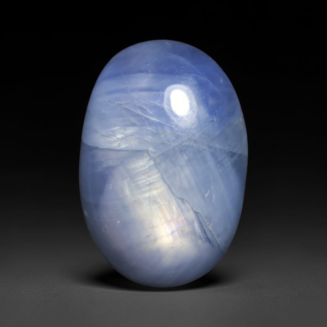 5.40ct Natural Unheated Burmese Blue Star Sapphire Oval Cabochon Loose Gemstone, 53BQ: This smoothly polished oval cabochon features natural Burmese blue star sapphire, formed with densely aligned rutile needle inclusions required to produce asterism. The gently domed surface is expertl