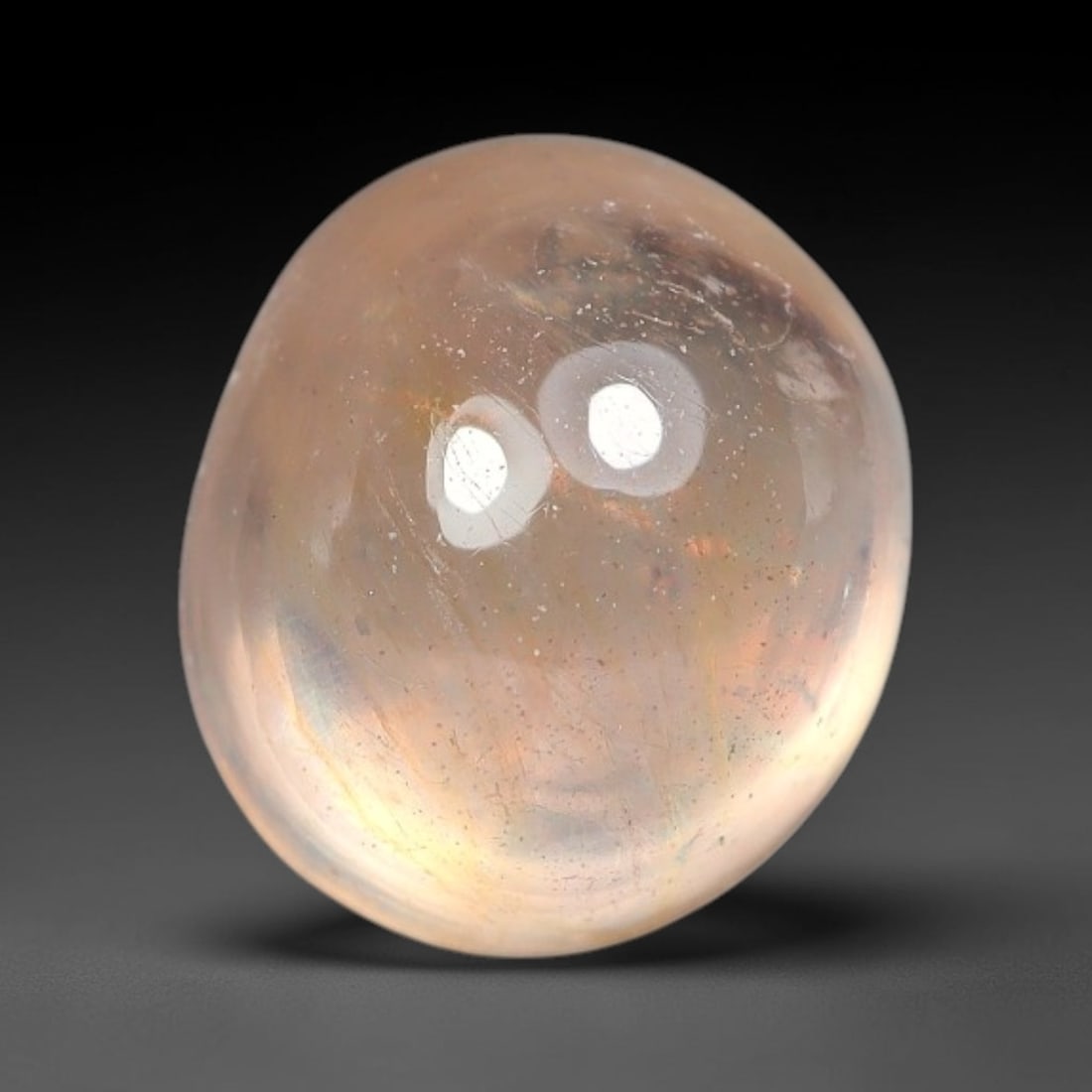 2.27ct Natural Sri Lankan Padparadscha Sapphire Loose Gemstone, 66BF: This fully polished Padparadscha sapphire features soft warm peach-orange blended body tone, with faint natural mineral traces scattered throughout its crystalline interior, measured at calibrated dim
