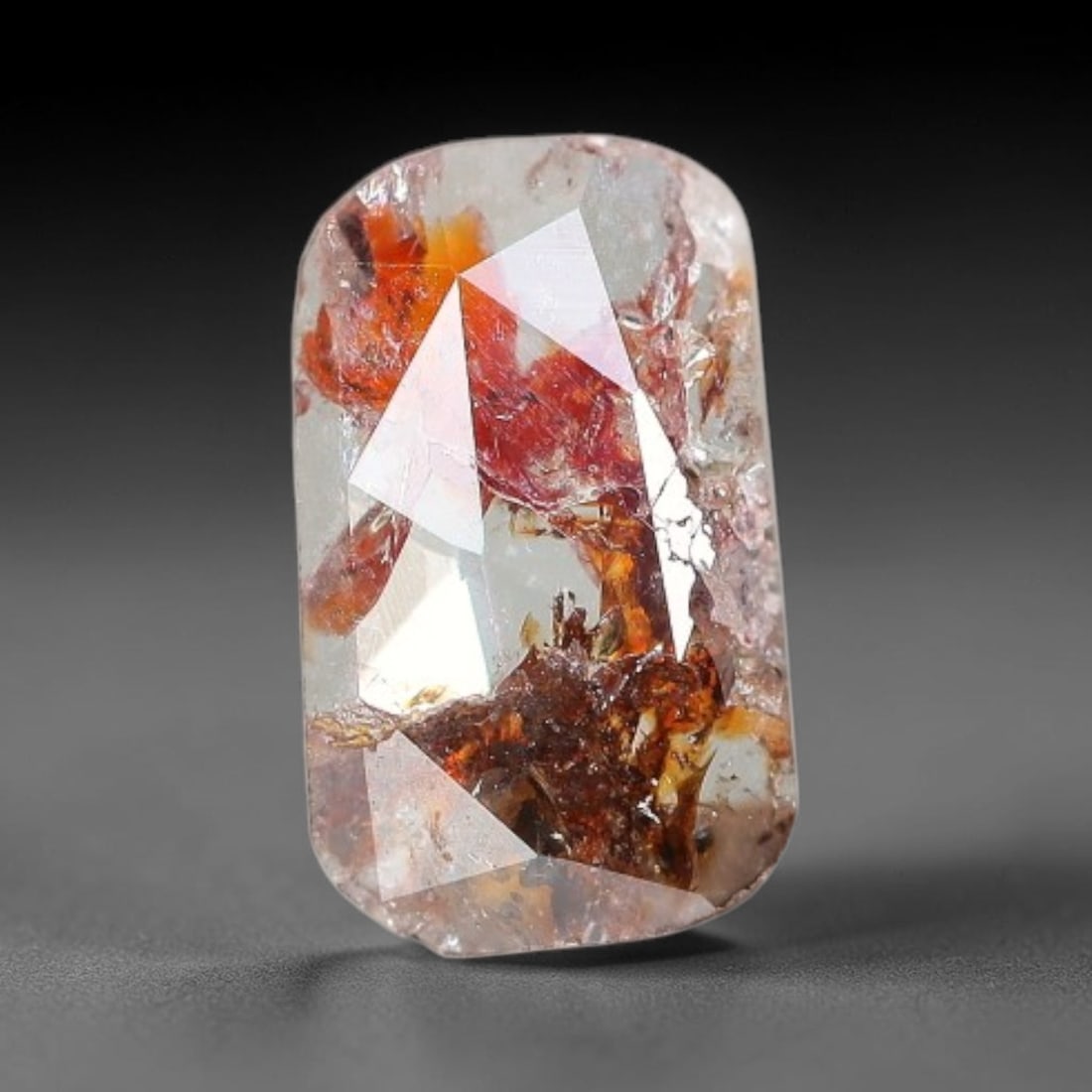 0.34ct Natural Fancy Diamond Slice, 63BG: This unique natural diamond slice features a delicate hand-executed rose cut surface, showcasing captivating pictorial mineral inclusions trapped within the diamond matrix. Measuring 6.7x4x1mm, the th